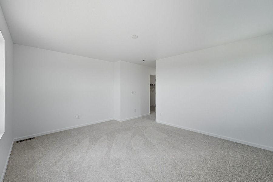 Spacious, unfurnished interior of a new home in The Town Collection at Independence, Elizabeth (Image 18).