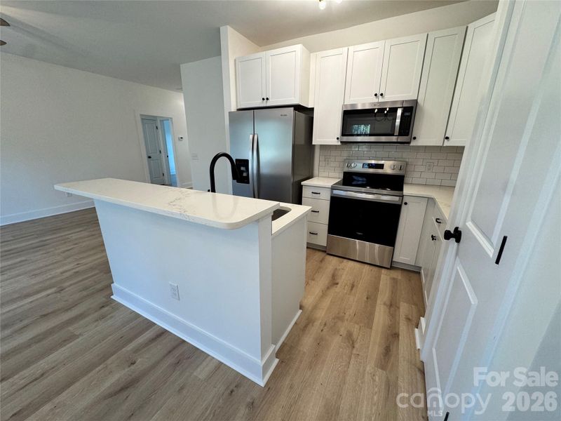 Furnished interior view inside a new home in , Marshville (Image 4).