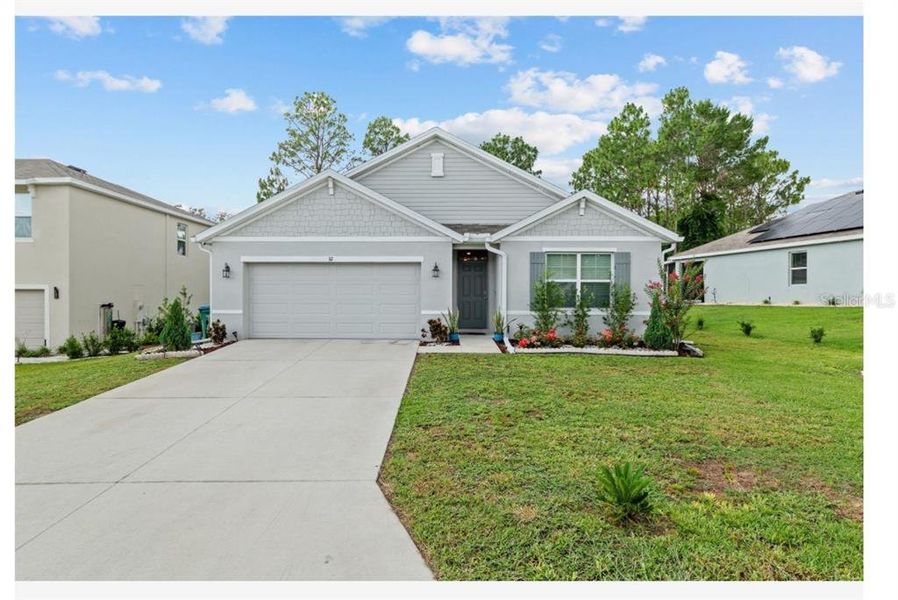 Front exterior of a new home in Lake Diamond, Ocala, FL, highlighting curb appeal (Image 8).