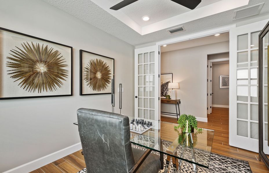 Representative furnished interior of a home built from the Palmary by DiVosta in Talon Preserve on Palmer Ranch, Nokomis (Image 41).