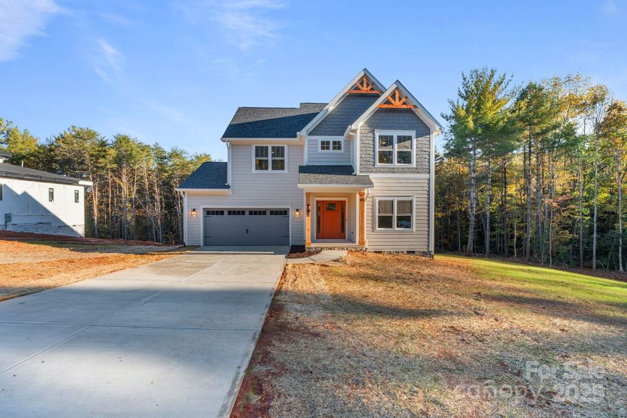 Front exterior of a new home in , Hickory, NC, highlighting curb appeal (Image 28).