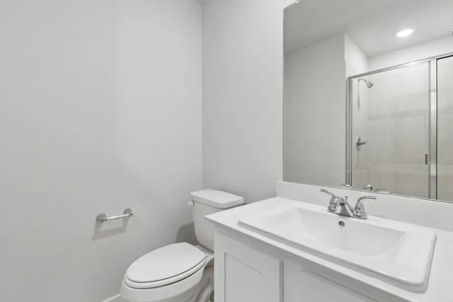 Bathroom in the Oscar home plan by Trophy Signature Homes – REPRESENTATIVE PHOTO Bathroom in the Oscar home plan by Trophy Signature Homes – REPRESENTATIVE PHOTO
