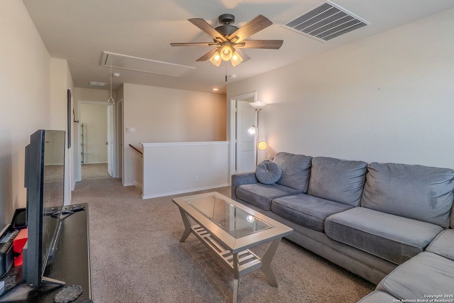 Furnished interior view inside a new home in The Links at River Bend, Floresville (Image 10).