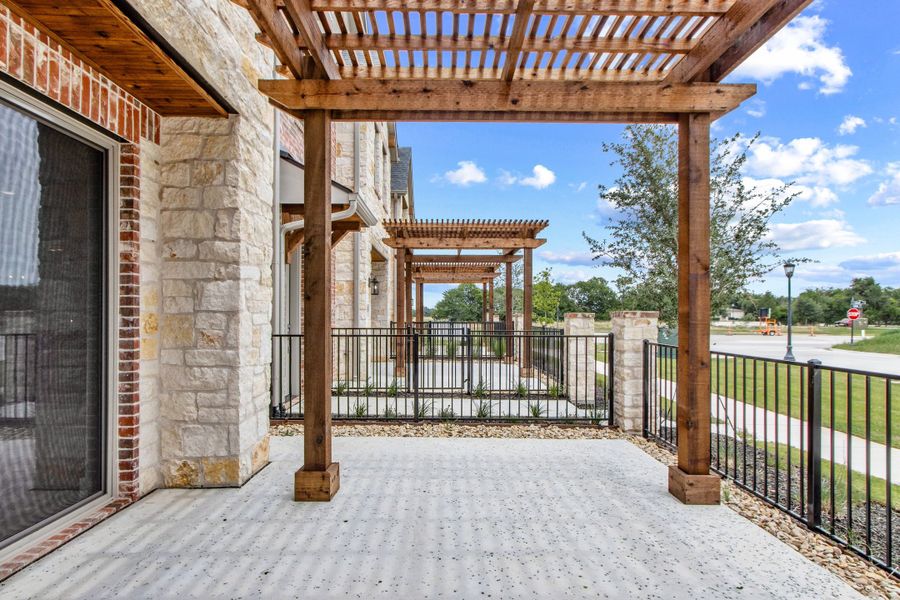 Exterior details and patio area of a home in The Tribute, The Colony (Image 4). Exterior details and patio area of a home in The Tribute, The Colony (Image 4).
