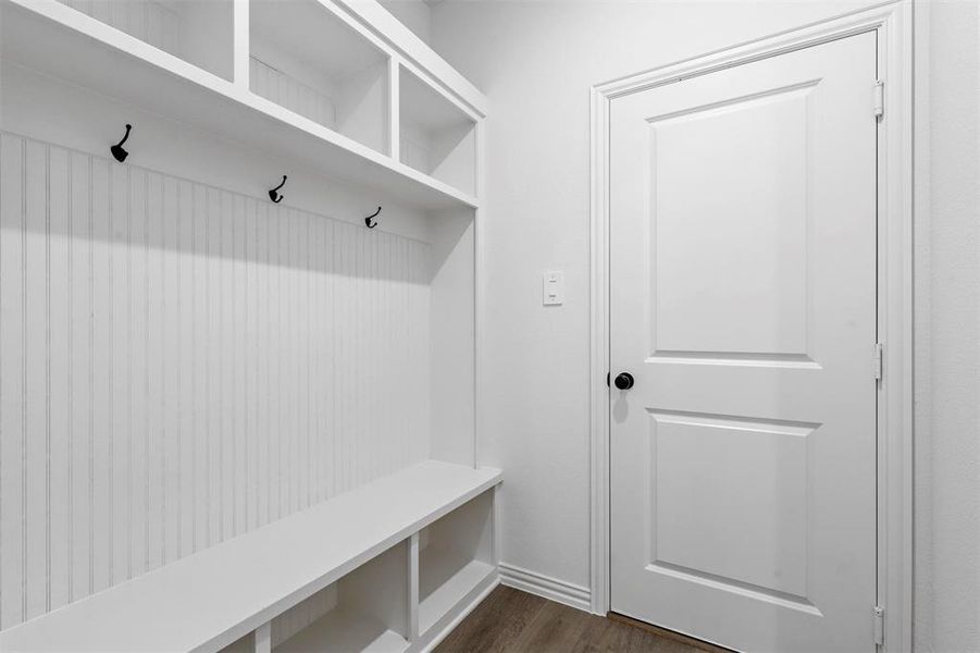 Mudroom featuring dark hardwood / wood-style floors