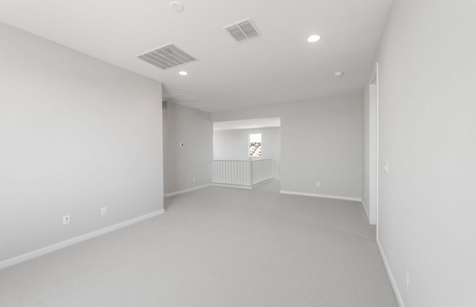 Spacious, unfurnished interior of a new home in Soleo, San Tan Valley (Image 32).