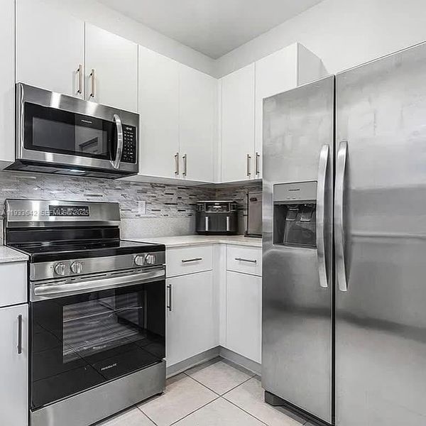 Furnished interior view inside a new home in , Lauderhill (Image 6).