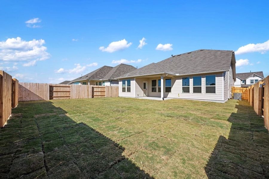 Exterior details and patio area of a home in Willow Springs, Buda (Image 29).
