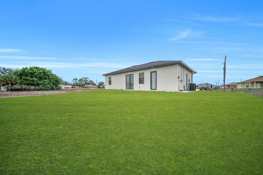 Exterior details and patio area of a home in , Lehigh Acres (Image 24).