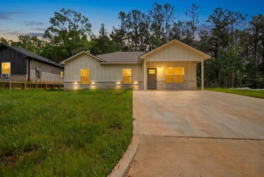Front exterior of a new home in , Jacksonville, TX, highlighting curb appeal (Image 2). Front exterior of a new home in , Jacksonville, TX, highlighting curb appeal (Image 2).