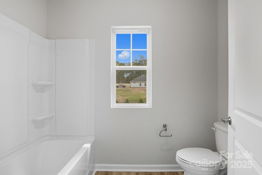 Furnished interior view inside a new home in , Statesville (Image 9).