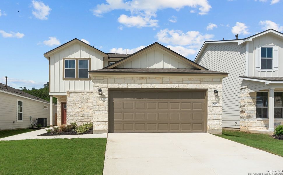 Front exterior of a new home in The Meadows at Hunters Ranch, San Antonio, TX, highlighting curb appeal (Image 17).