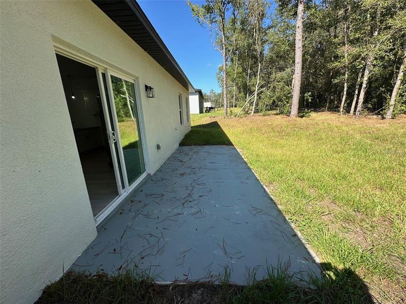 Exterior details and patio area of a home in , Citrus Springs (Image 4).