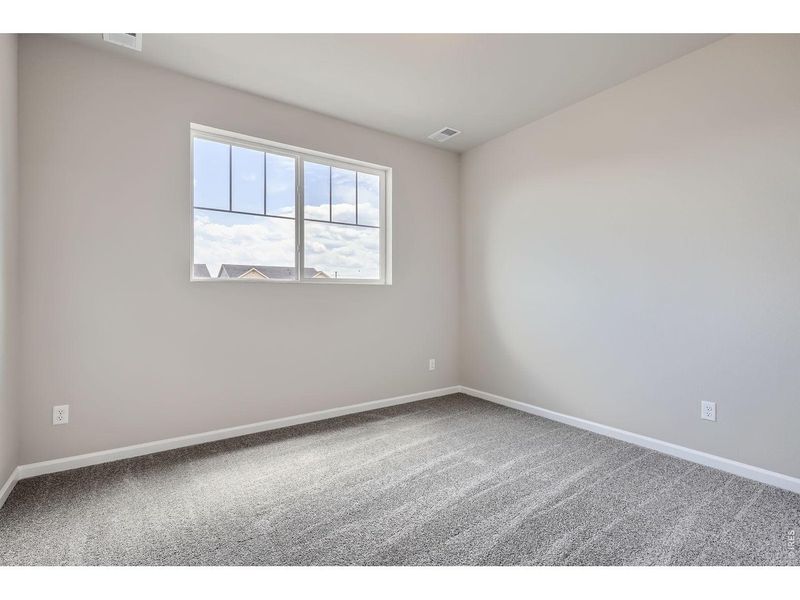 Spacious, unfurnished interior of a new home in Farmstead, Berthoud (Image 21).