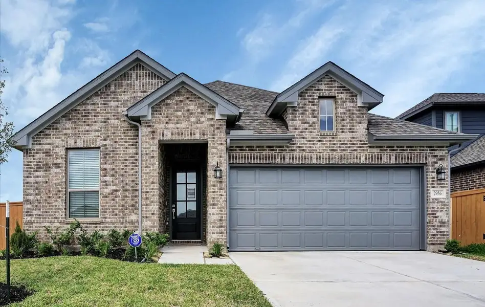 Front exterior of a new home in , Katy, TX, highlighting curb appeal (Image 1). Front exterior of a new home in , Katy, TX, highlighting curb appeal (Image 1).