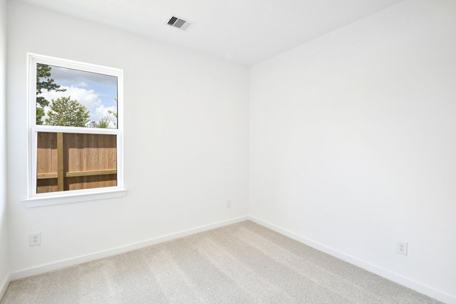 Spacious, unfurnished interior of a new home in Raburn Reserve 50s, Tomball (Image 29).