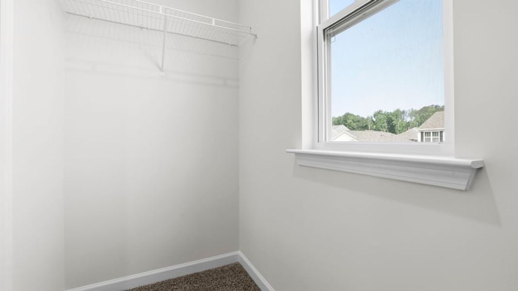 Spacious, unfurnished interior of a new home in Bentley Park, Greenwood (Image 34).