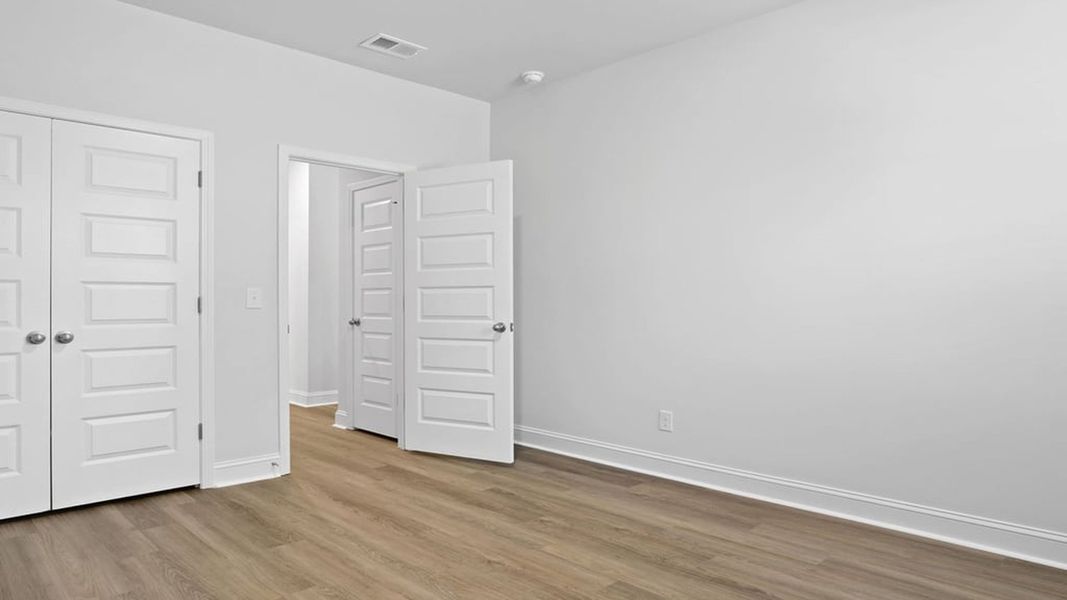 Representative unfurnished interior of a home built from the Harbor Oak by D.R. Horton in Laurel Grove, Guyton (Image 21).