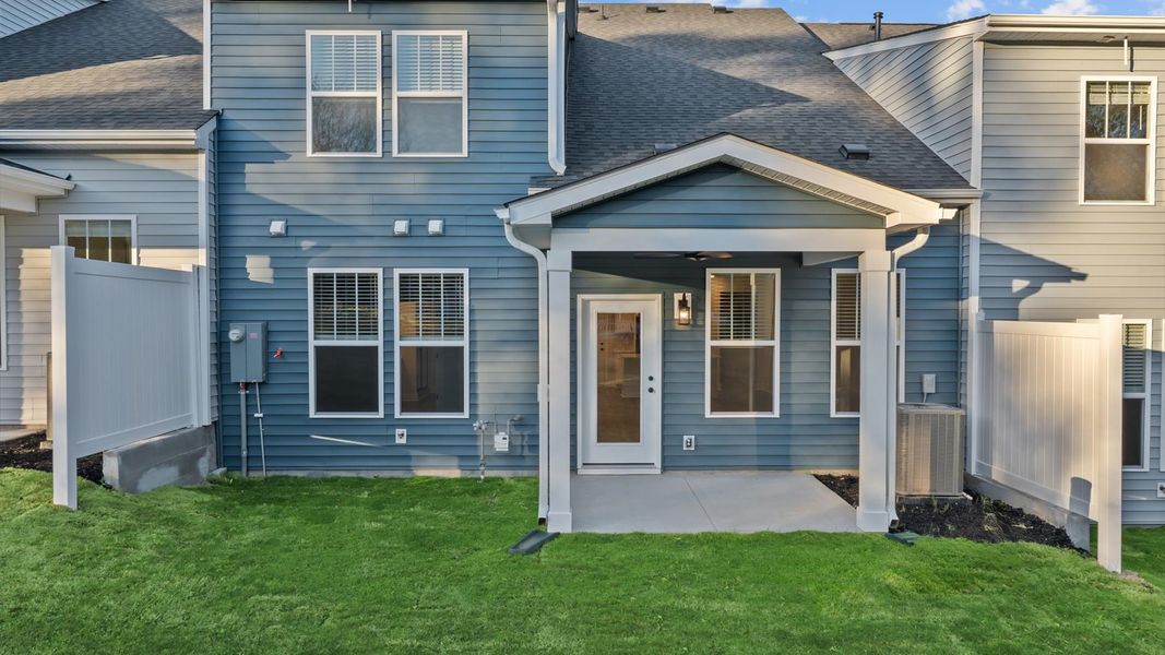 Vibrant rear outdoor space featuring a covered porch and exceptional craftsmanship Vibrant rear outdoor space featuring a covered porch and exceptional craftsmanship