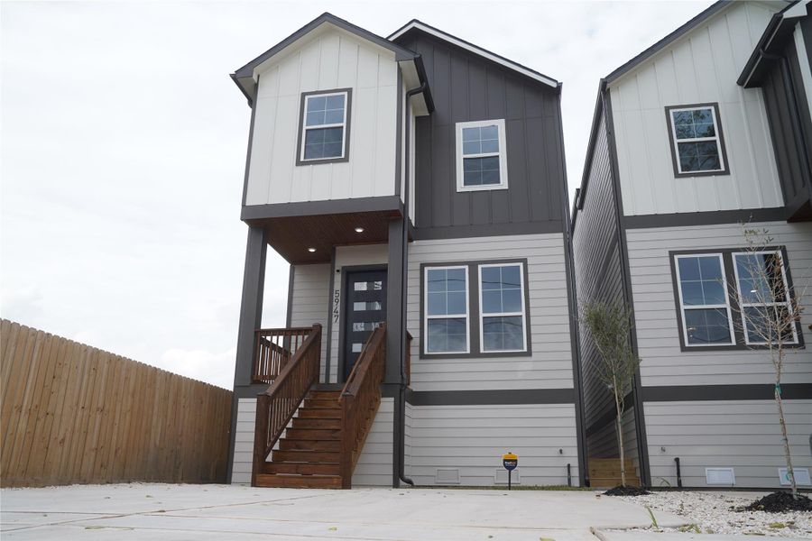 Front exterior of a new home in , Houston, TX, highlighting curb appeal (Image 1).