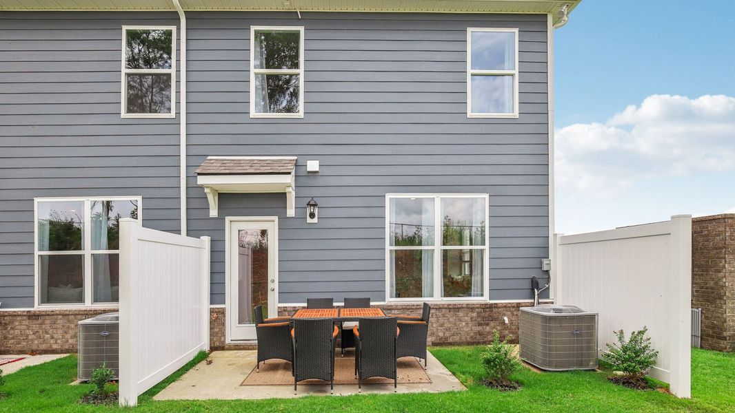 Exterior details and patio area of a home in King's Landing, Lewisburg (Image 2).