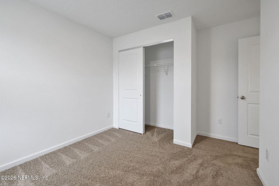 Spacious, unfurnished interior of a new home in Kasen Oaks, Jacksonville (Image 19).