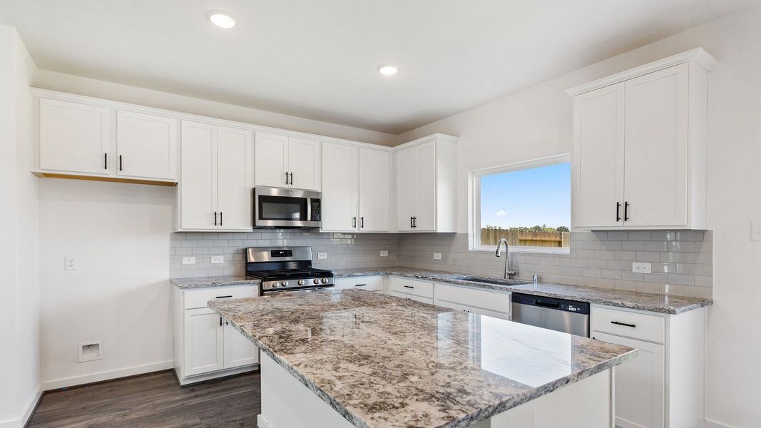 Furnished interior view inside a new home in Mostyn Springs, Magnolia (Image 13).