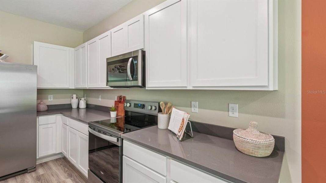 Furnished interior view inside a new home in Meadow Ridge at Epperson, Wesley Chapel (Image 11).
