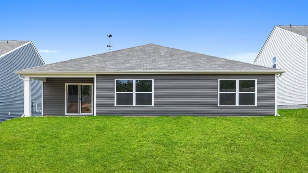 Exterior details and patio area of a home in Harrier Point, Woodruff (Image 2).