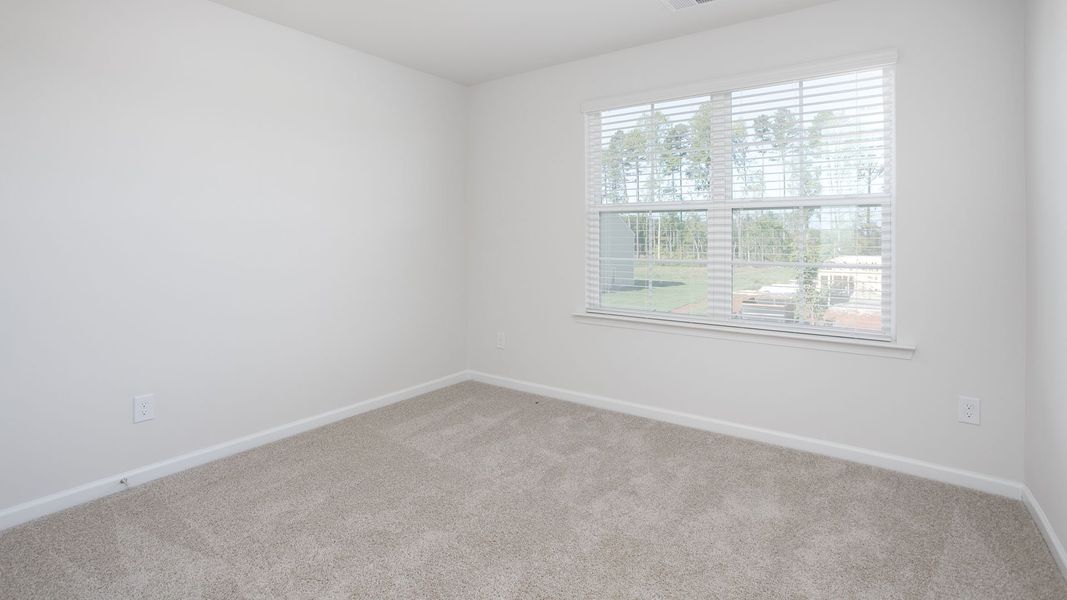 Representative unfurnished interior of a home built from the Oliver by D.R. Horton in Carter Ridge, Greenville (Image 7).