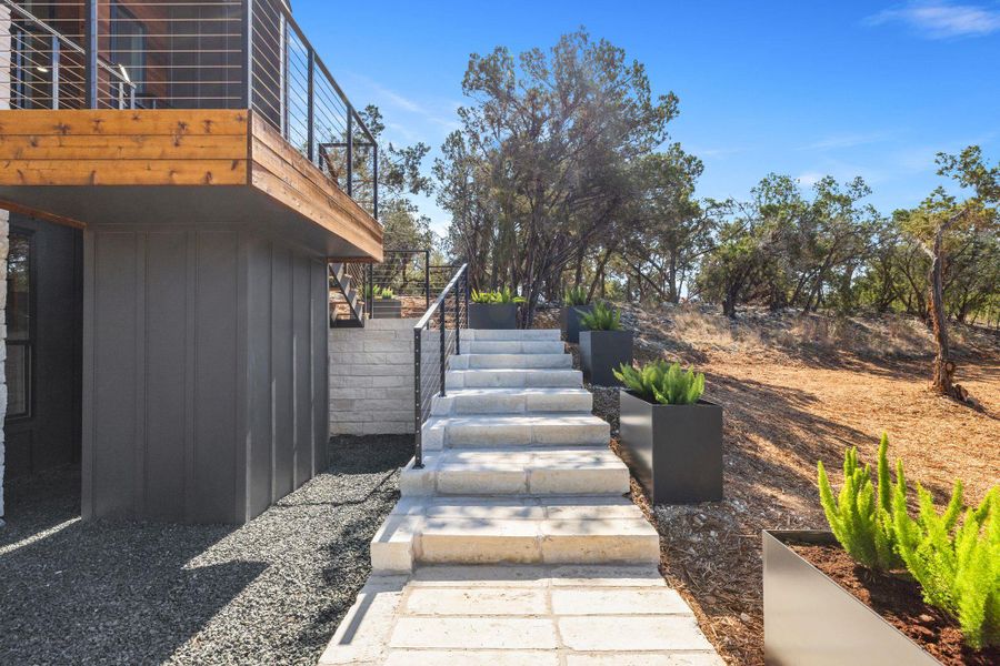 View of yard featuring stairway