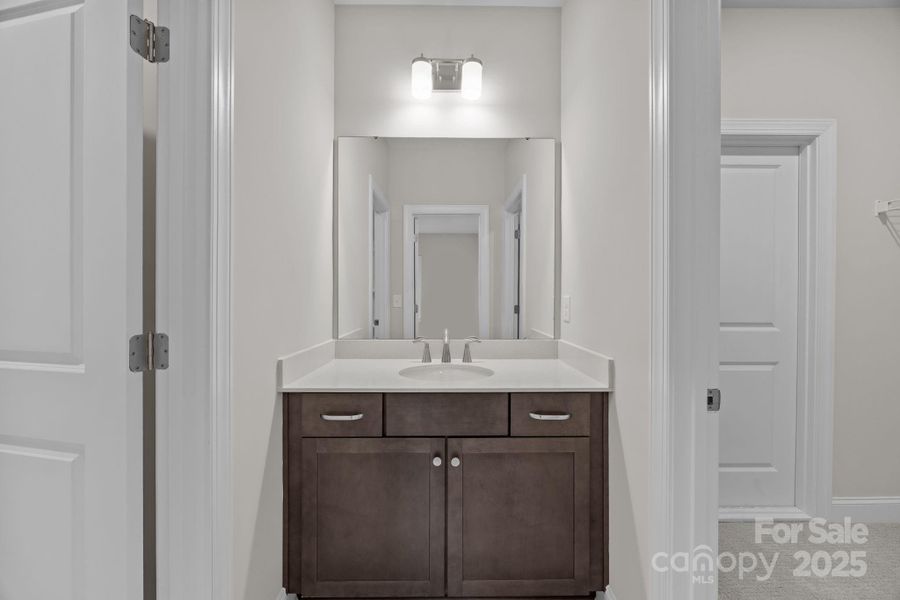 Jack n Jill Bath. To the right of vanity is a walk in closet. The door inside the walk in closet goes to a HUGE walk in storage space Jack n Jill Bath. To the right of vanity is a walk in closet. The door inside the walk in closet goes to a HUGE walk in storage space