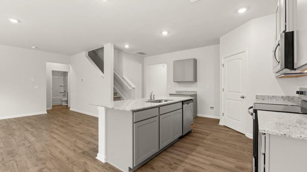 Furnished interior view inside a new home in Oaks at Cedar Grove, Fairburn (Image 9).