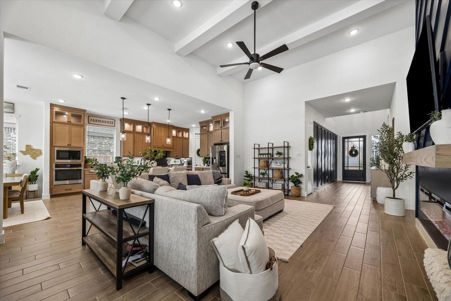 OPEN CONCEPT LIVING AT ITS FINEST.  NOTE THE HIGH CEILINGS AND ARCHITECTURAL DETAILS