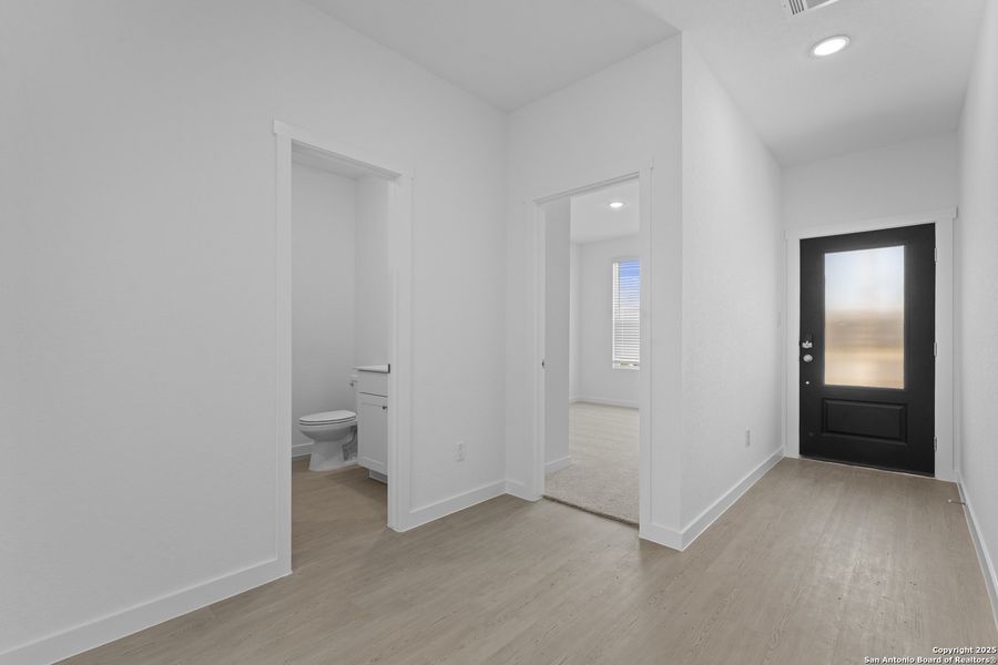 Spacious, unfurnished interior of a new home in Waterwheel: Coastline Collection, San Antonio (Image 18).