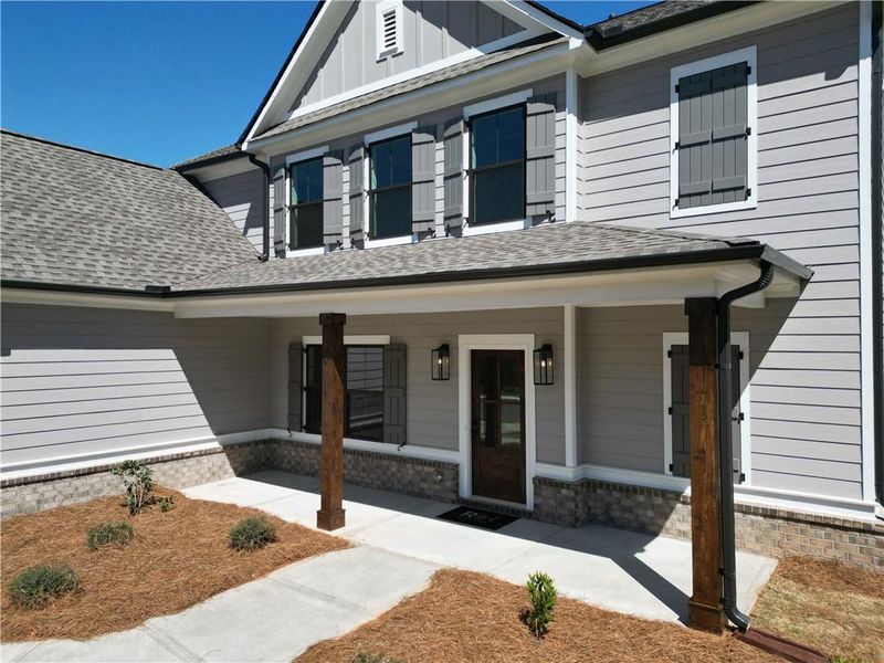 Exterior details and patio area of a home in Weslyn Park, Social Circle (Image 3).