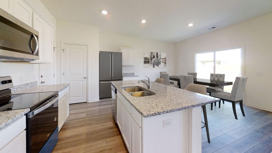 Furnished interior view inside a new home in Watson Hill, Summerville (Image 7).