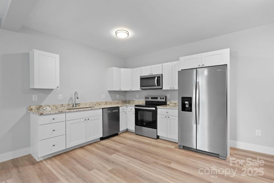 Furnished interior view inside a new home in , Asheville (Image 10).