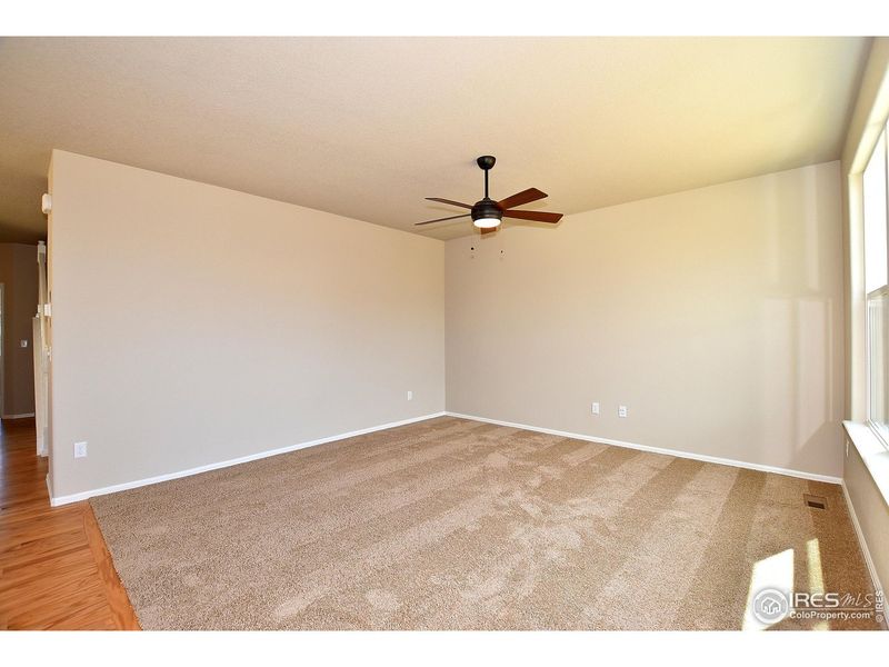 Spacious, unfurnished interior of a new home in Union Colony West, Greeley (Image 29).