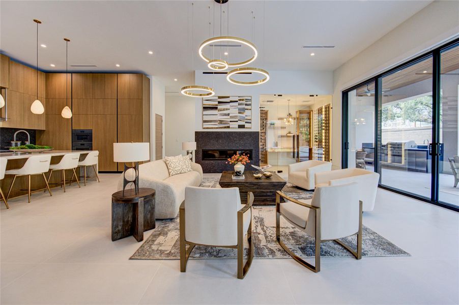 Main living area with linear fireplace and custom built-ins.