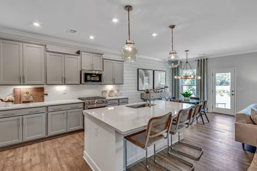 Furnished interior view inside a new home in Riversprings, Dacula (Image 4).