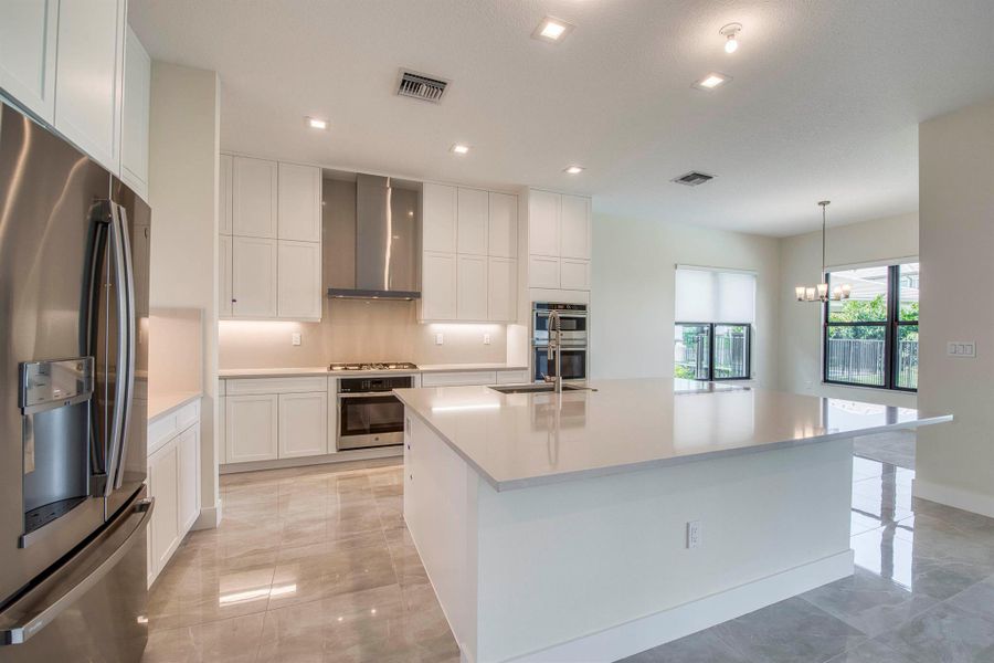Furnished interior view inside a new home in Apex at Avenir, Palm Beach Gardens (Image 42).