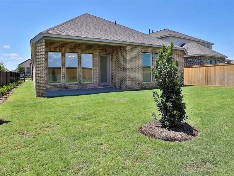 Exterior details and patio area of a home in Bridgeland 45', Cypress (Image 3).