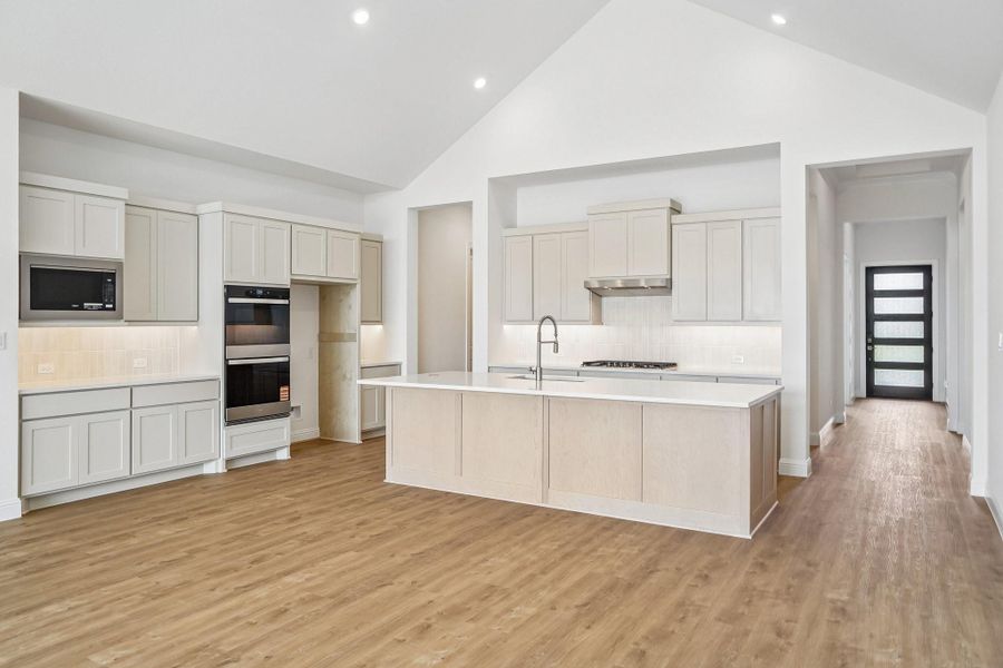 Furnished interior view inside a new home in Del Bello Lakes 60', Manvel (Image 19).