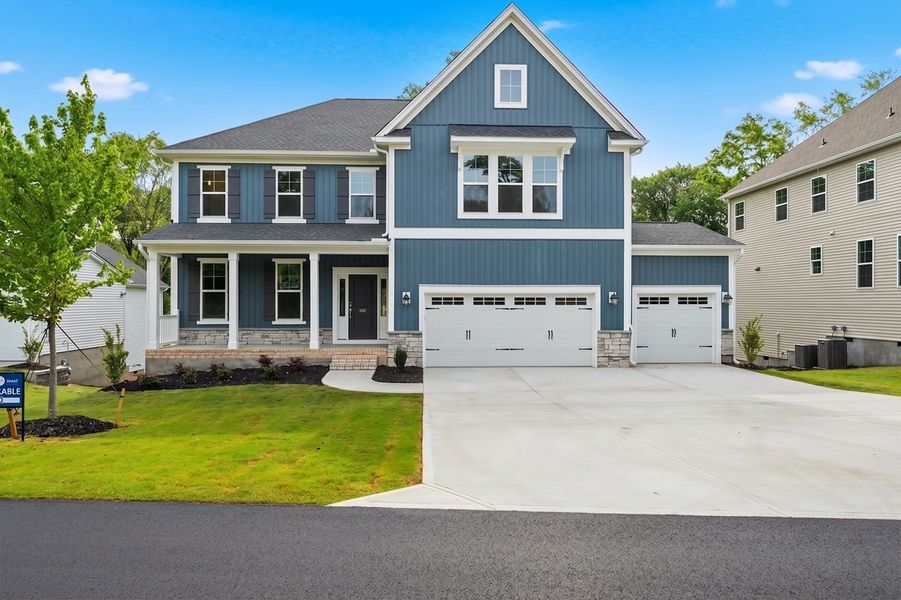 Front exterior of a new home in Timberland Grove, Anderson, SC, highlighting curb appeal (Image 1). Front exterior of a new home in Timberland Grove, Anderson, SC, highlighting curb appeal (Image 1).