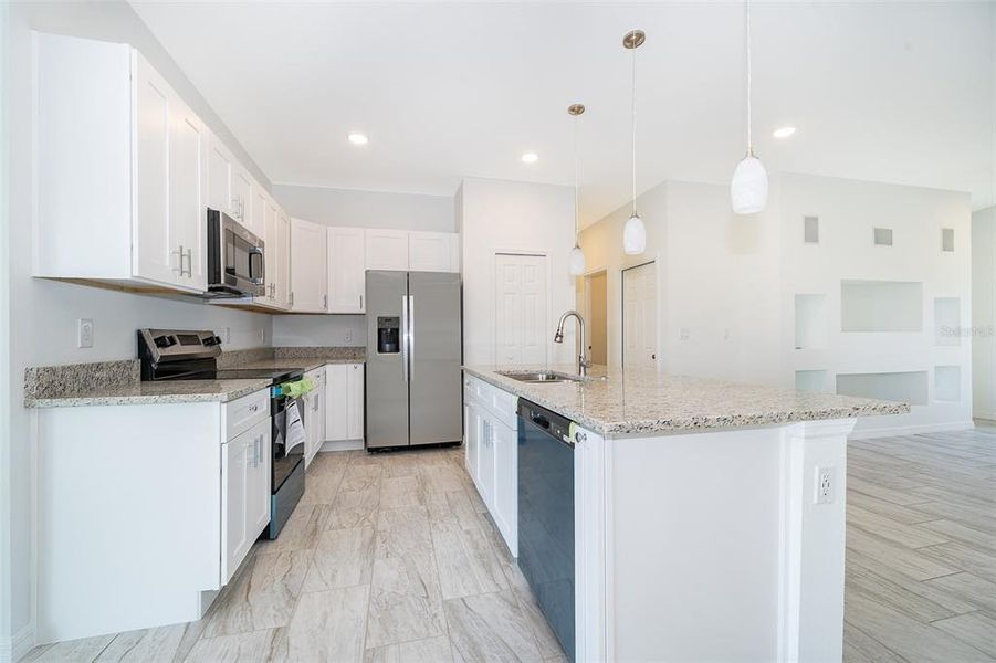 Furnished interior view inside a new home in , Kissimmee (Image 9).