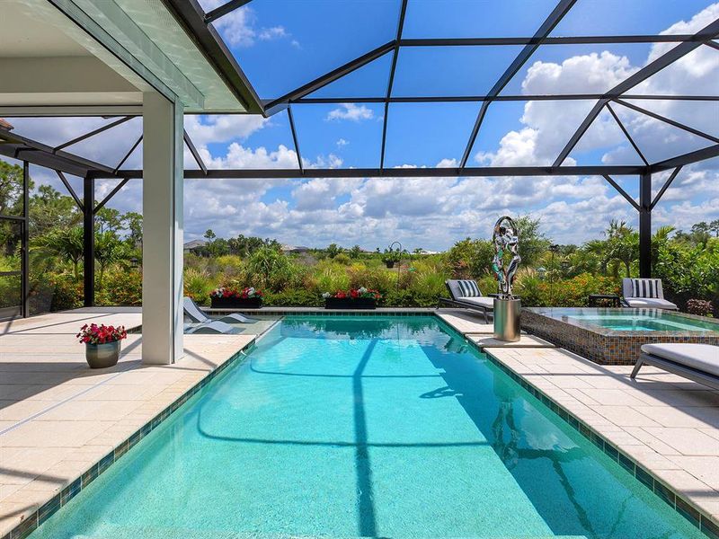 Exterior details and patio area of a home in Wild Blue at Waterside, Sarasota (Image 32). Exterior details and patio area of a home in Wild Blue at Waterside, Sarasota (Image 32).