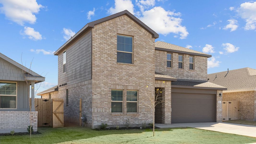 Representative exterior photo of a completed home built from the GLENWOOD by D.R. Horton in Northwest Passage, Midland, TX (Image 14). Representative exterior photo of a completed home built from the GLENWOOD by D.R. Horton in Northwest Passage, Midland, TX (Image 14).