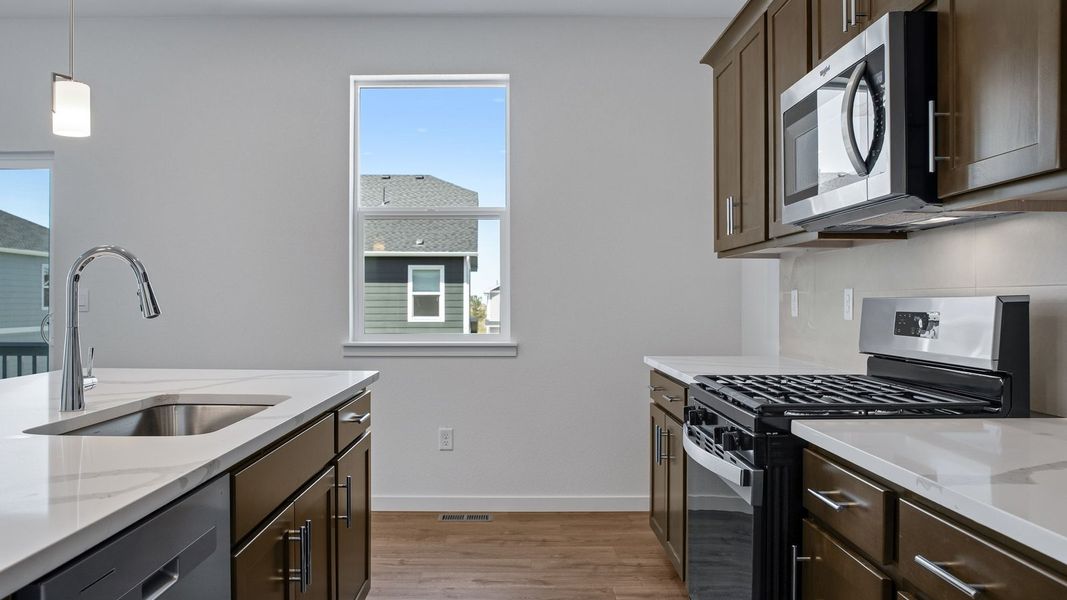 Furnished interior view inside a new home in Trails at Crowfoot, Parker (Image 10).