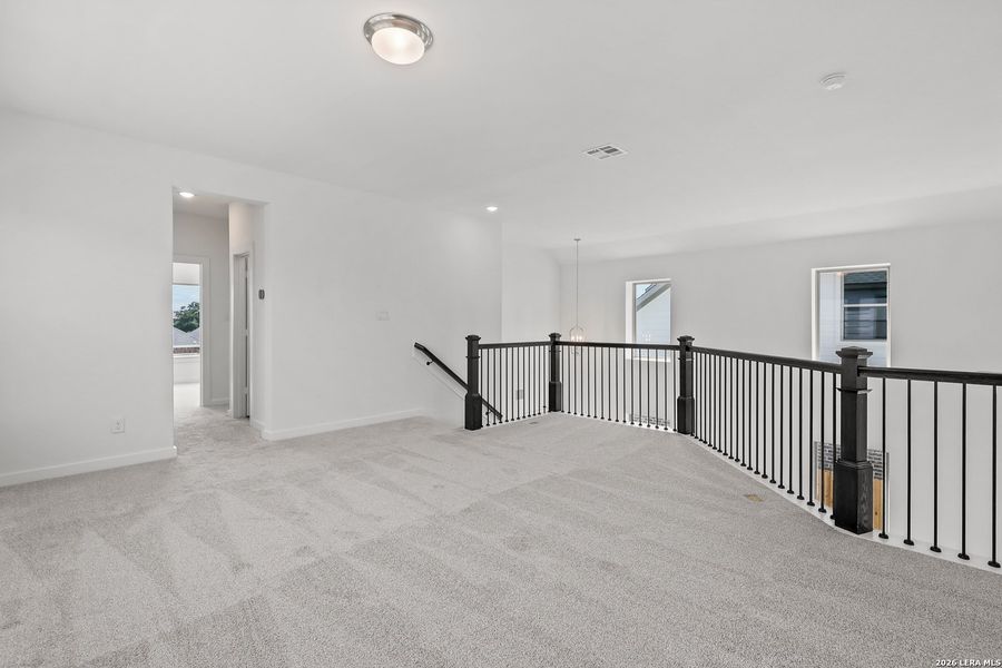 Spacious, unfurnished interior of a new home in Stillwater Ranch, San Antonio (Image 29).